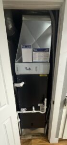 Hisense AUH-3624 air handler installed in closet downflow configuration in Tacoma WA 98443