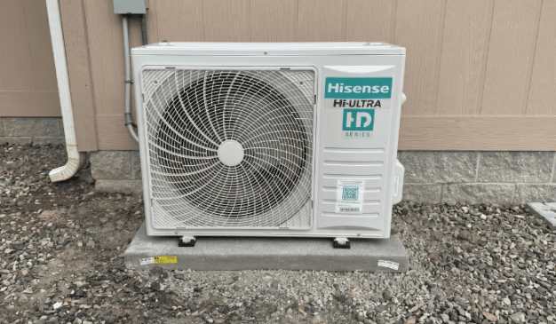 Inverter-driven Hisense heat pump installed outside a manufactured home in Graham, Washington