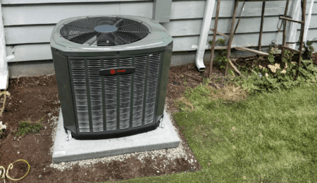 Trane central air conditioner installed outside a Tacoma home in the 98499 zip code