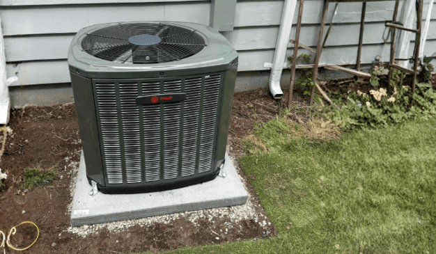Trane central air conditioner installed outside a Tacoma home in the 98499 zip code