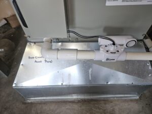 Air duct sealing access panel on a home plenum in Tacoma