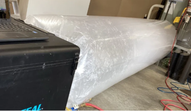 Aeroseal duct sealing machine sealing a home's ducts from the inside in Tacoma