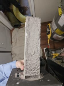Heavily clogged furnace air filter, a common cause of poor indoor air quality