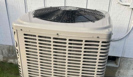 Outdoor AC condenser running during bad air quality at a Tacoma home