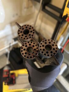 Furnace burner orifices removed during a tune-up inspection in Tacoma